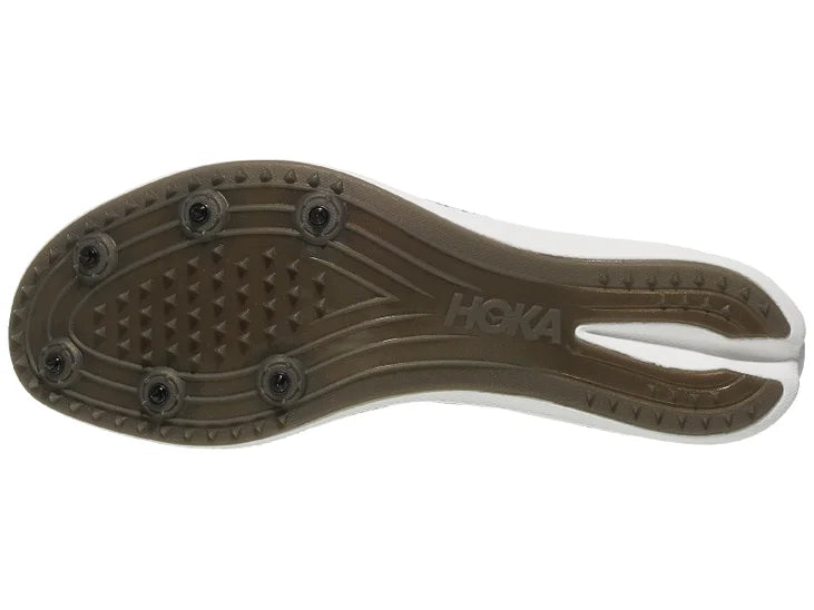 Hoka Crescendo MD Spikes/ Black/silver upper. White midsole. Bottom view.