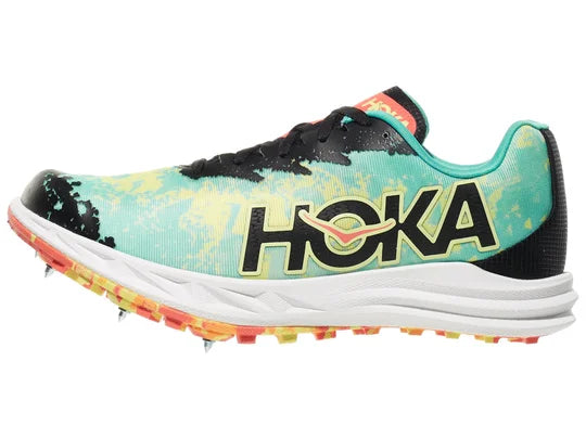 Hoka Crescendo XC Spike. Multicolored upper. White midsole. Lateral view.