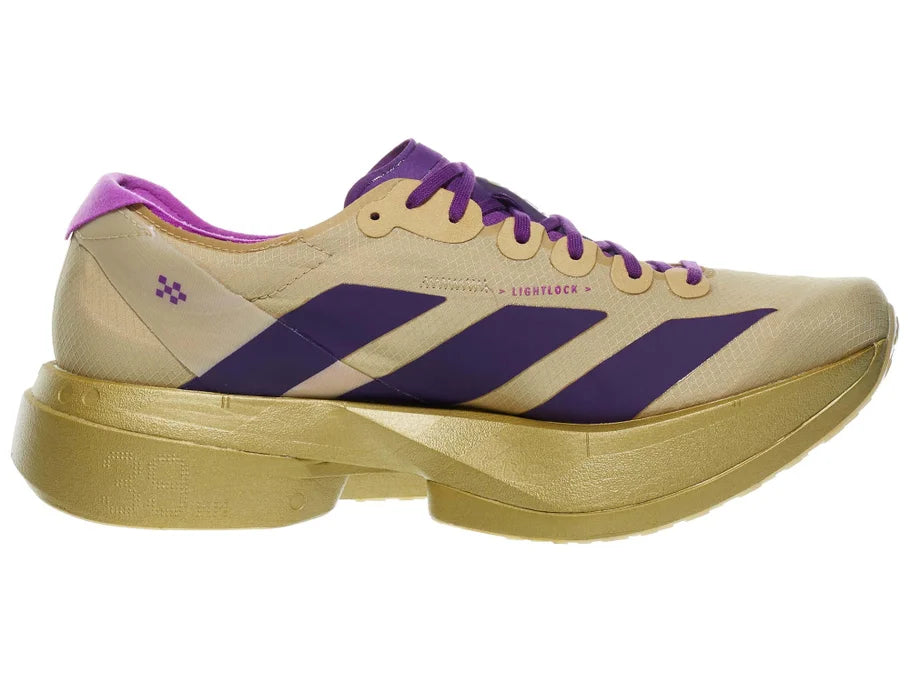 Men's Adidas Adizero Adios Pro 4. Tan upper. Gold midsole. Medial view.
