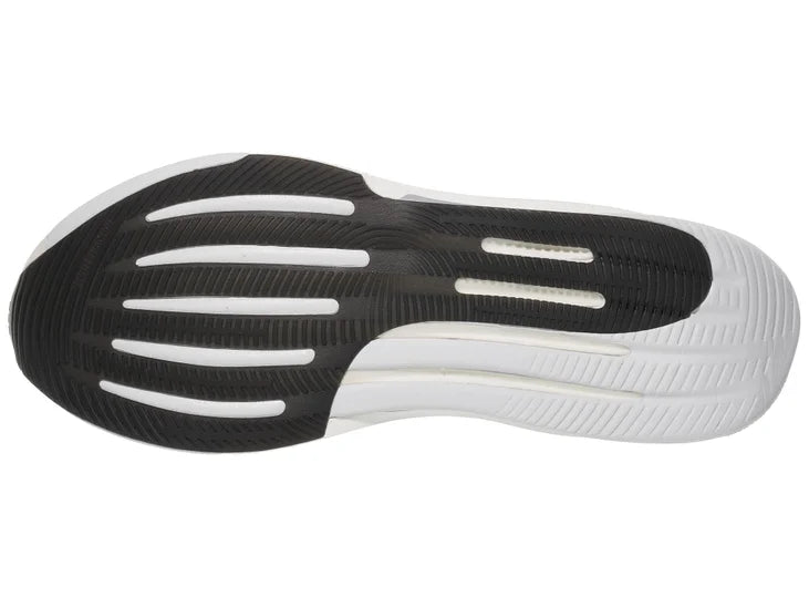 Men's Adidas Supernova Prima. Black upper. White midsole. Bottom view.