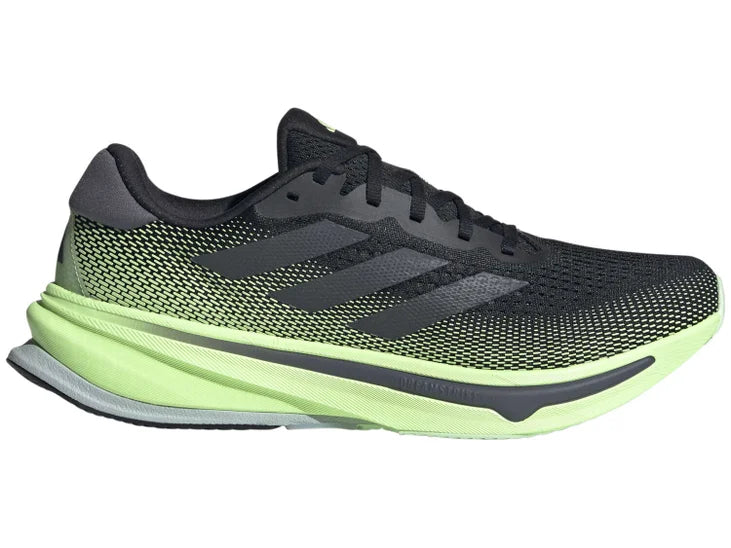 Men's Adidas Supernova Rise - majority black shoe with a bright green fade and green midsole.  Lateral view