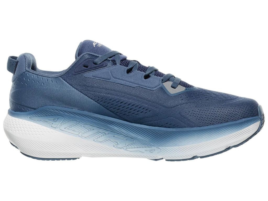 Men's Altra FWD Via. Navy blue upper. White midsole. Medial view.