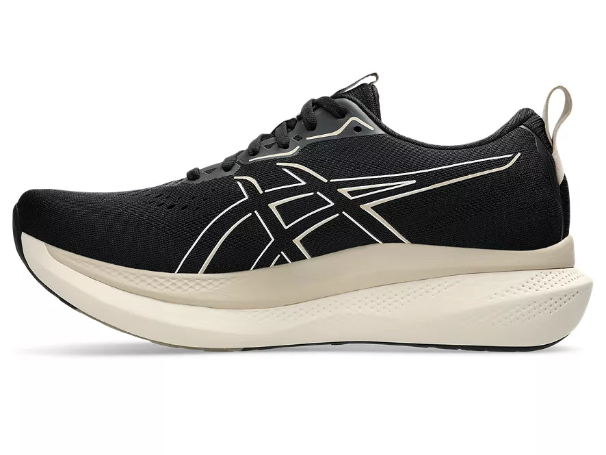 Men's Asics GlideRide Max. Black upper. Off White midsole. Medial view.