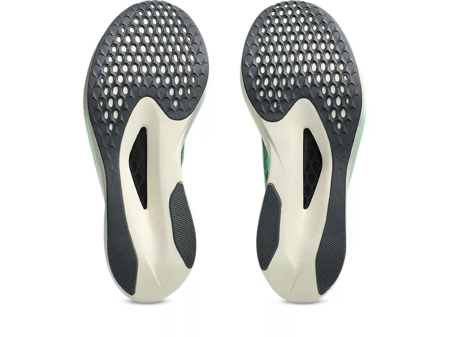 Men's Asics Magic Speed 5. Green upper. White midsole. Bottom view.