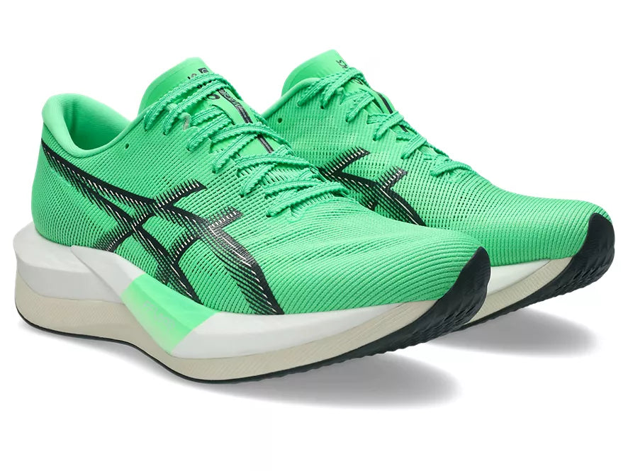 Men's Asics Magic Speed 5. Green upper. White midsole. Lateral view.