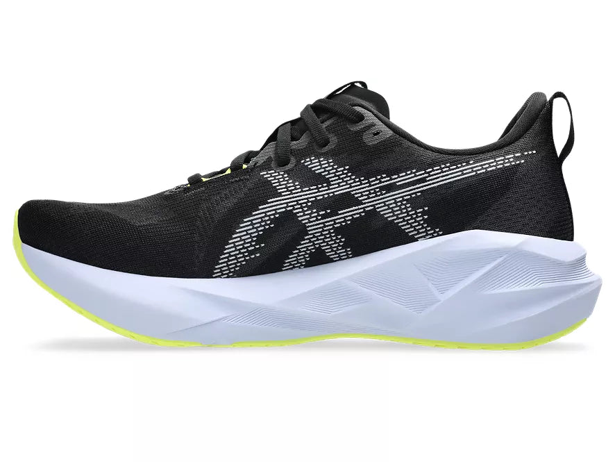 Men's Asics Novablast 5. Black upper. White midsole. Medial view.