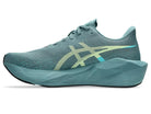 Men's Asics Novablast 6. Green upper. Green midsole. Medial view.
