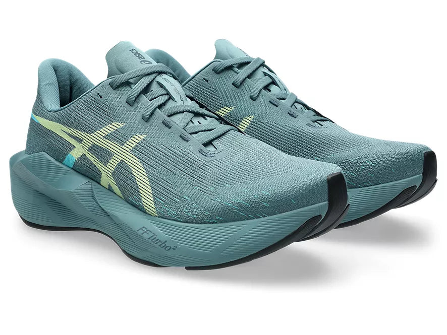 Men's Asics Novablast 6. Green upper. Green midsole. Lateral view.