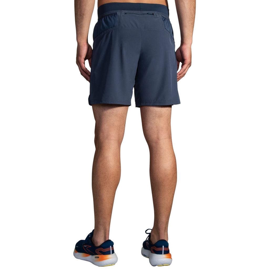 Men's Brooks Sherpa 7" Shorts. Blue/Grey. Rear view.