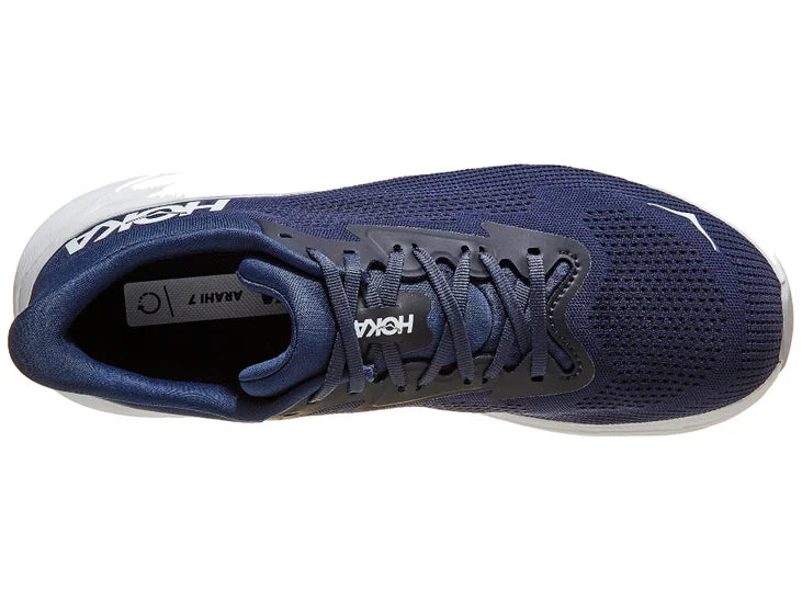 Men's Hoka Arahi 7. Dark Blue upper. White midsole. Top view.