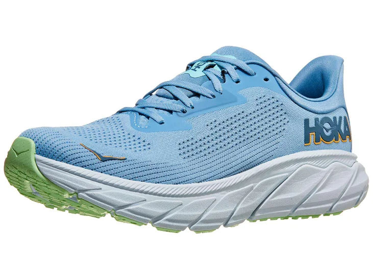 Men's Hoka Arahi 7. Light Blue upper. White midsole. Lateral view.