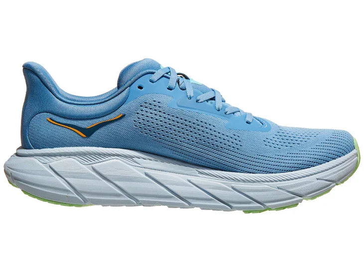 Men's Hoka Arahi 7. Light Blue upper. White midsole. Medial view.