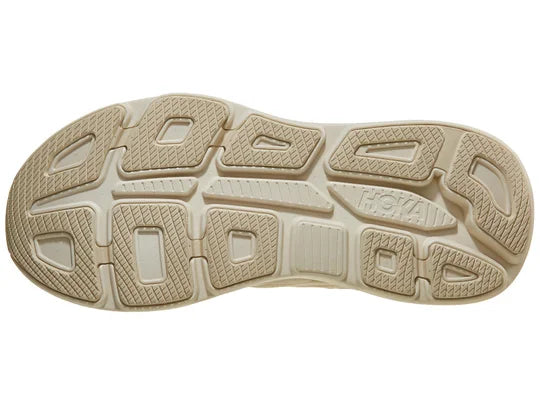Men's Hoka Bondi 9. Cream upper. Cream midsole. Bottom view.