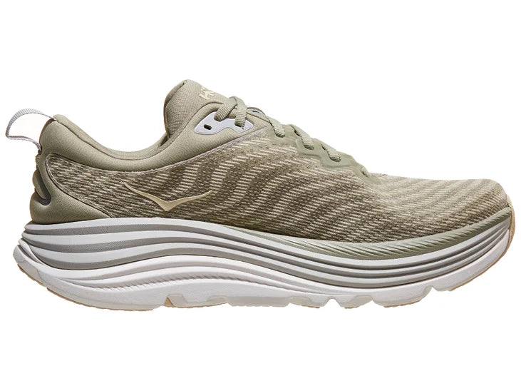 Men's Hoka Gaviota 5. Tan upper. White midsole. Medial view.