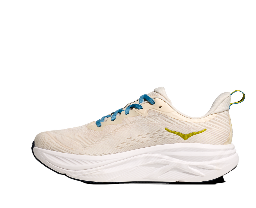 Men's Hoka Skyflow. Cream upper. White midsole. Medial view.