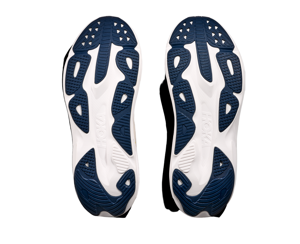 Men's Hoka Skyflow. Cream upper. White midsole. Bottom view.