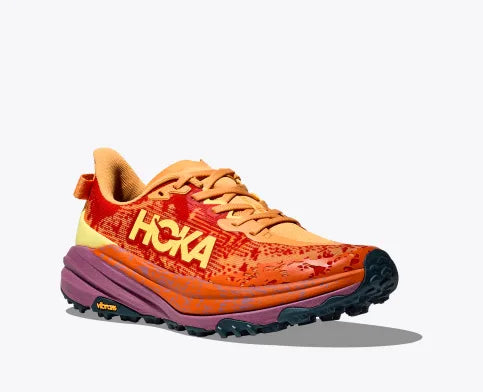 Men's Hoka Speedgoat 6. Red upper. Red/Purple midsole. Lateral view.