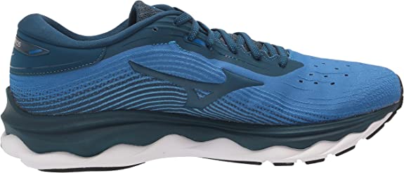 Men's Mizuno Wave Sky 5. Blue upper. White midsole. Medial view.