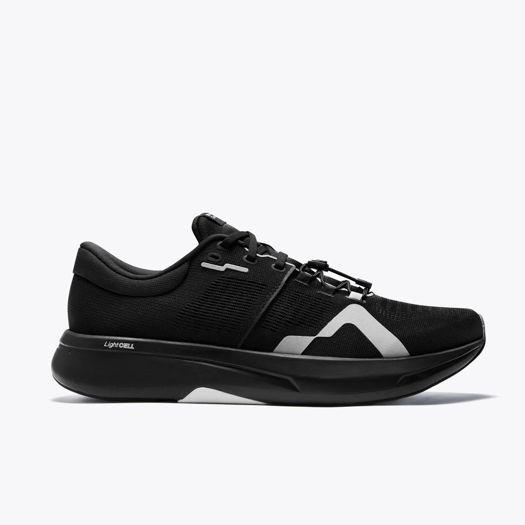 Men's Mount to Coast. R1. Black upper. Black midsole. Lateral view.