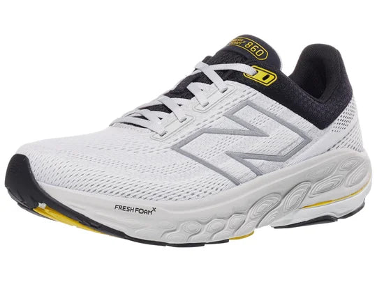 Men's New Balance 860 v14. White upper. Off White midsole. Lateral view.