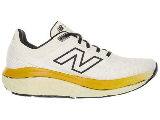 Men's New Balance 860 v14. White upper. Yellow midsole. Medial view.
