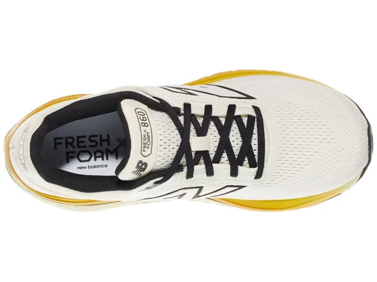 Men's New Balance 860 v14. White upper. Yellow midsole. Top view.