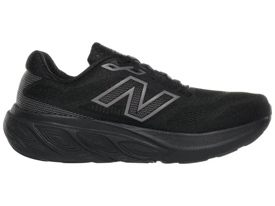 Men's New Balance 880 v15. Black upper. Black midsole. Medial view.