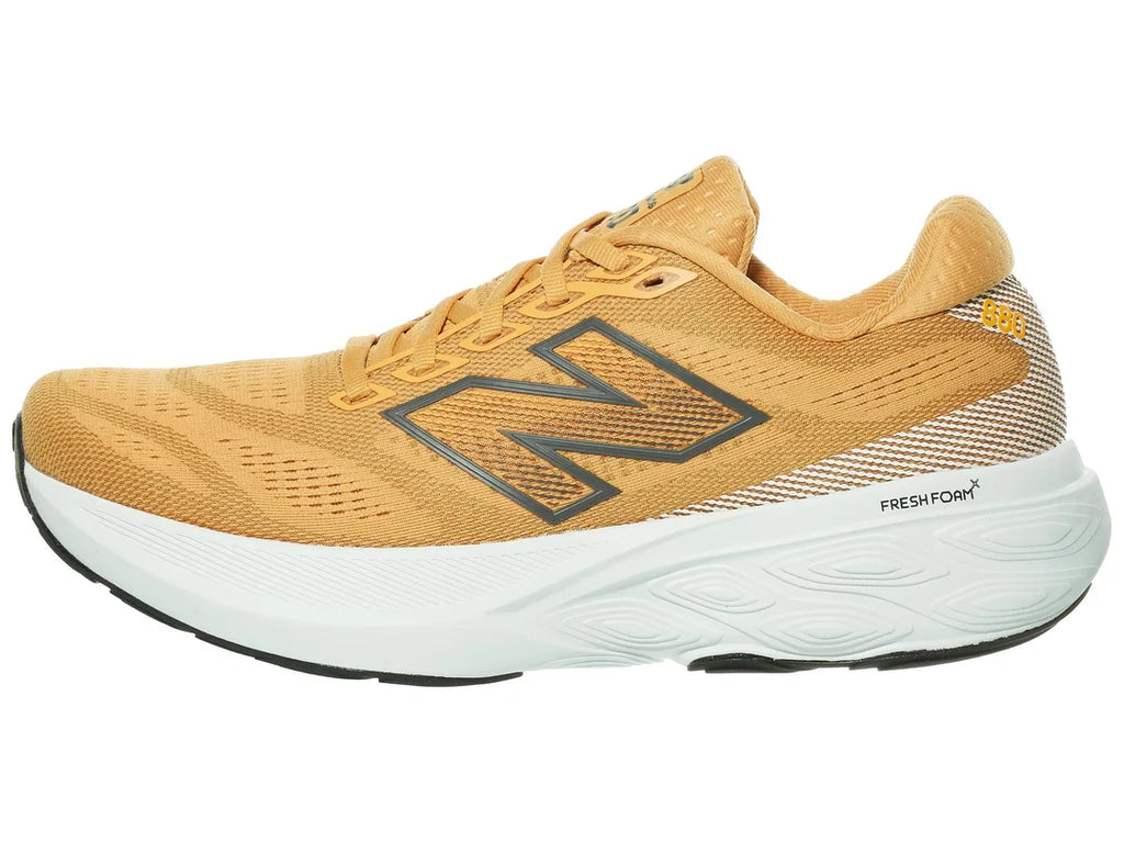 Men's New Balance 880v15. Orange upper. White midsole. Lateral view.