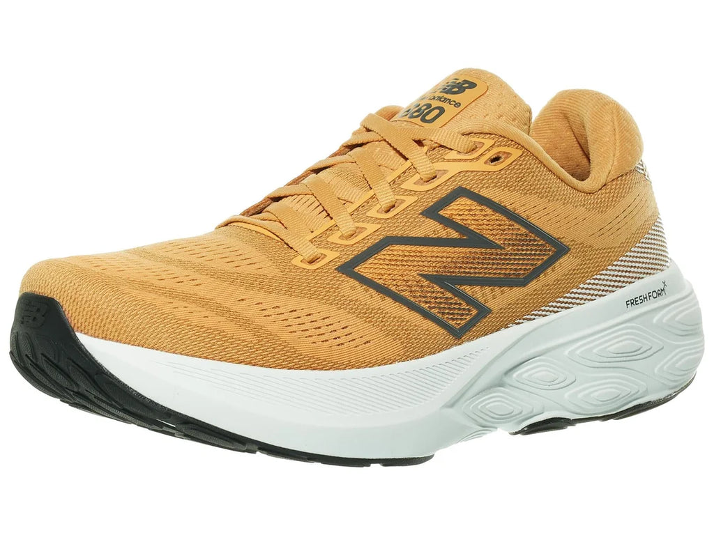 Men's New Balance 880v15. Orange upper. White midsole. Lateral view.