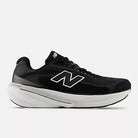 Men's New Balance 860 v15. Black upper. White midsole. Lateral view.