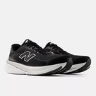 Men's New Balance 860 v15. Black upper. White midsole. Lateral view.