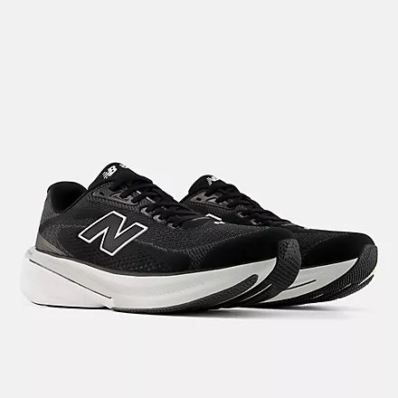 Men's New Balance 860 v15. Black upper. White midsole. Lateral view.