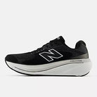 Men's New Balance 860 v15. Black upper. White midsole. Medial view.