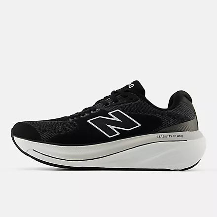 Men's New Balance 860 v15. Black upper. White midsole. Medial view.