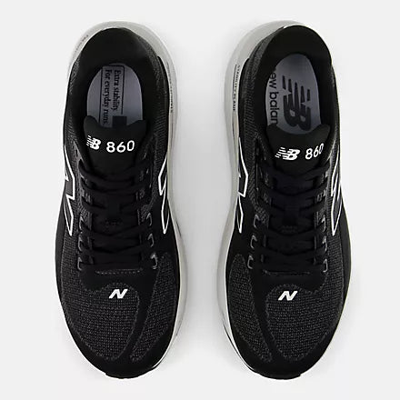 Men's New Balance 860 v15. Black upper. White midsole. Top view.
