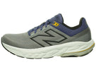 Men's New Balance 860 v14. Grey upper. Off White midsole. Lateral view.