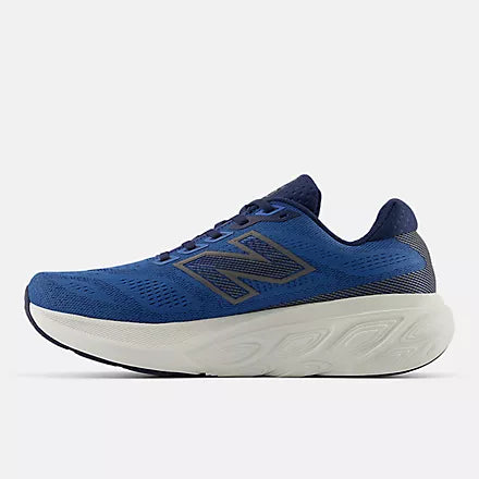 Men's New Balance 880 v15. Blue upper. White midsole. Medial view.