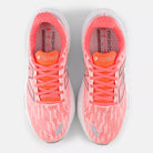 Men's New Balance Balos v1. Pink upper. White midsole. Top view.