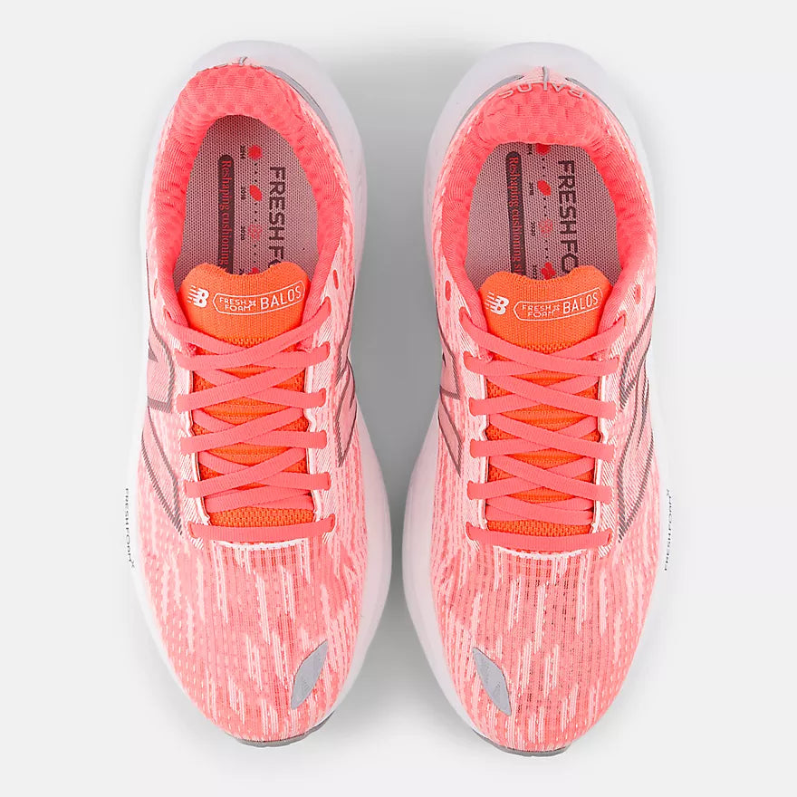 Men's New Balance Balos v1. Pink upper. White midsole. Top view.