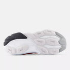 Men's New Balance Balos v1. Pink upper. White midsole. Bottom view.