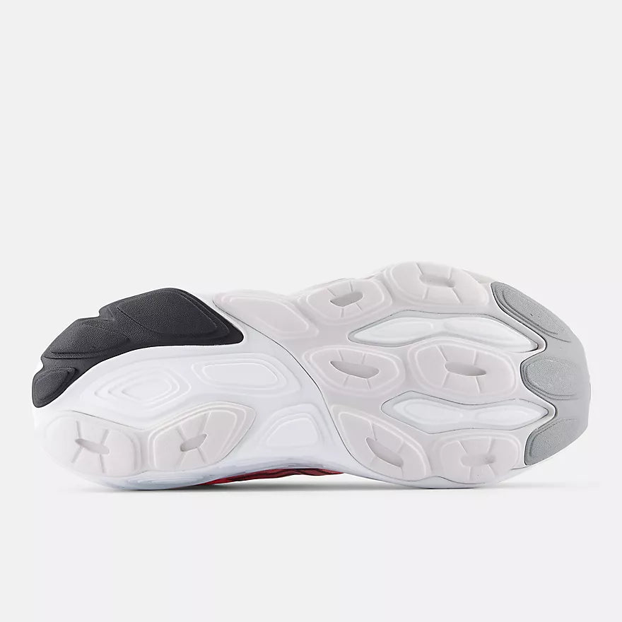 Men's New Balance Balos v1. Pink upper. White midsole. Bottom view.