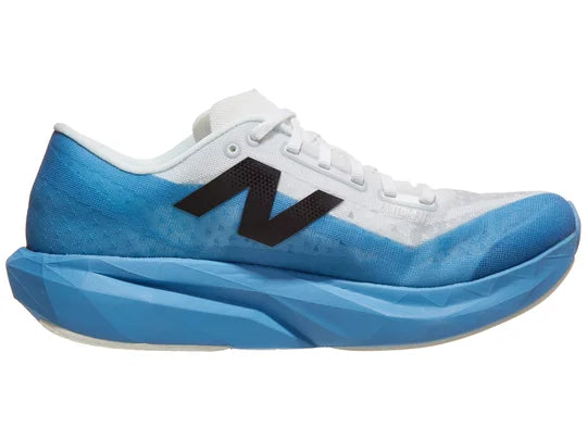Men's New Balance Rebel v4. Blue/White upper. Blue/White midsole. Medial view.