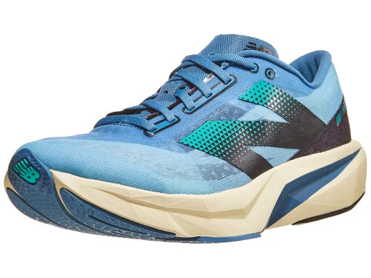 Men's New Balance Rebel v4. Blue upper. Off White midsole. Lateral view.