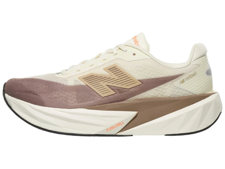 Men's New Balance Rebel v5. Off White/Tan upper. Off White/Tan midsole. Lateral view.