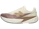 Men's New Balance Rebel v5. Off White/Tan upper. Off White/Tan midsole. Lateral view.