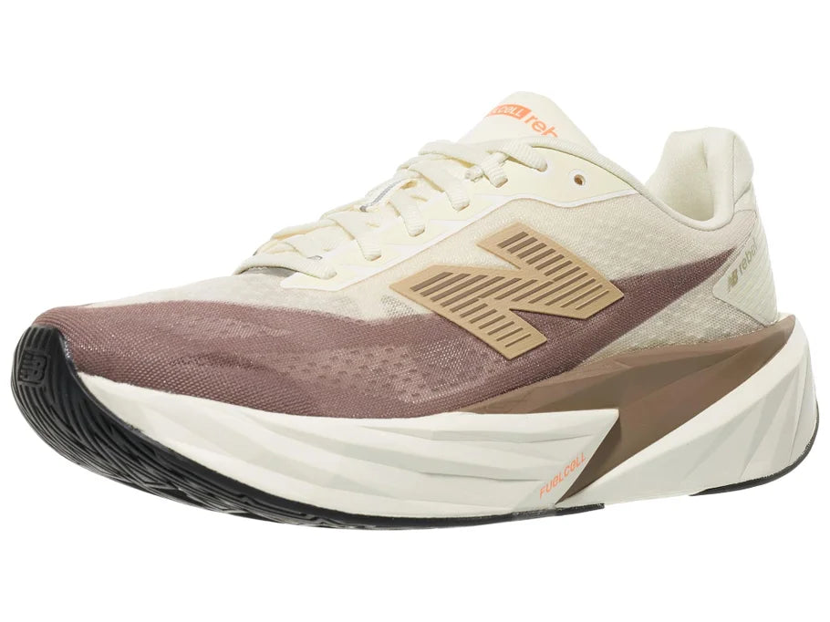 Men's New Balance Rebel v5. Off White/Tan upper. Off White/Tan midsole. Lateral view.
