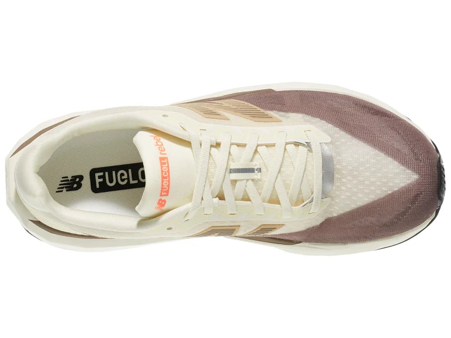 Men's New Balance Rebel v5. Off White/Tan upper. Off White/Tan midsole. Top view.