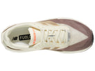 Men's New Balance Rebel v5. Off White/Tan upper. Off White/Tan midsole. Top view.