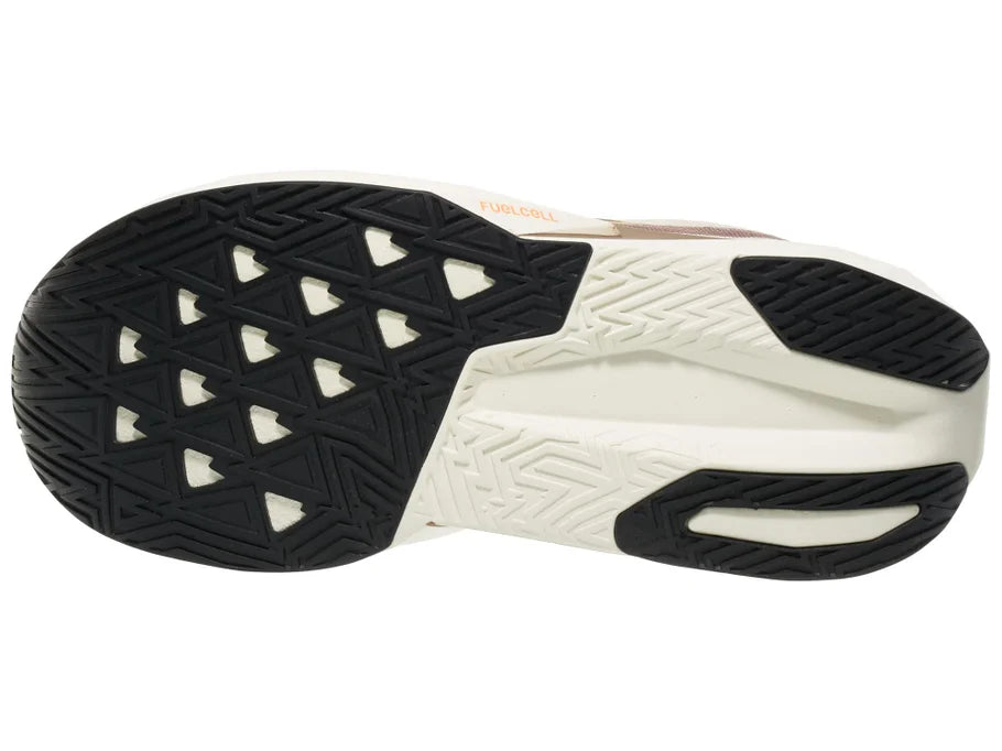 Men's New Balance Rebel v5. Off White/Tan upper. Off White/Tan midsole. Bottom view.