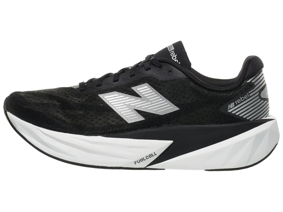 Men's New Balance Rebel v5. Black upper. White midsole. Lateral view.
